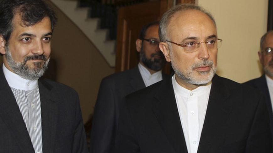 Iranian Foreign Minister Ali Akbar Salehi (R) is seen in Nicosia June 26, 2012. Iran on Tuesday urged the European Union to reconsider an embargo on Iranian oil that comes into effect on July 1, saying it wanted engagement and not confrontation with the bloc.   REUTERS/Andreas Manolis  (CYPRUS - Tags: POLITICS)