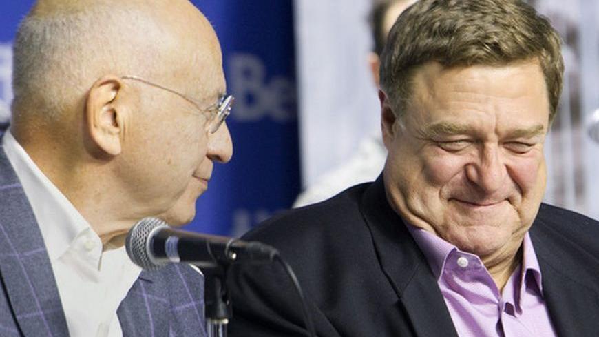 Actor John Goodman (R) and Alan Arkin attend a news conference to promote the film ' Argo' during the 37th Toronto International Film Festival,  September 8, 2012.  REUTERS/Fred Thornhill  (CANADA - Tags: ENTERTAINMENT)