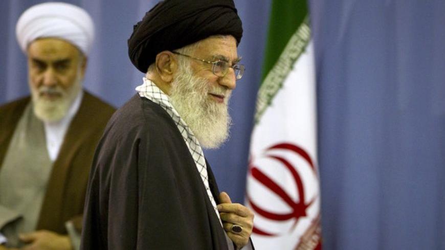 EDITORS' NOTE: Reuters and other foreign media are subject to Iranian restrictions on leaving the office to report, film or take pictures in Tehran.
Iran's Supreme Leader Ayatollah Ali Khamenei departs after casting his ballot in the parliamentary election in Tehran March 2, 2012. Polls opened on Friday for a parliamentary election in Iran that will test the popularity of the clerical establishment at a time of a standoff with the West over the country's nuclear programme.  REUTERS/Caren Firouz (IRAN - Tag