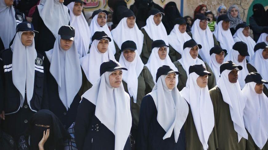 Hamas policewomen take part in a graduation ceremony for members of Hamas security forces in Gaza City December 17, 2012. REUTERS/Suhaib Salem (GAZA - Tags: POLITICS MILITARY)