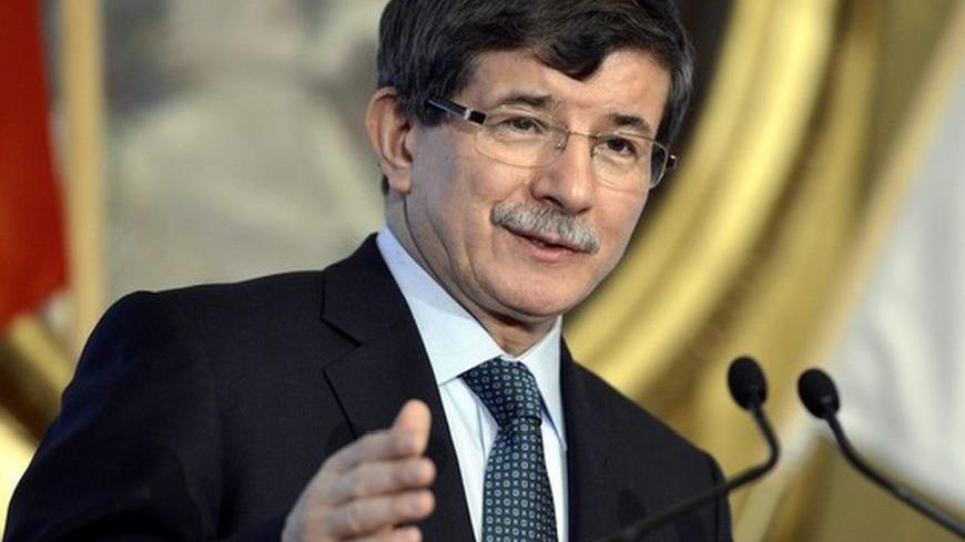 Turkish Foreign Minister Ahmet Davutoglu speaks during a news conference in Helsinki December 19, 2012. REUTERS/Kimmo Mantyla/Lehtikuva   (FINLAND - Tags: POLITICS) THIS IMAGE HAS BEEN SUPPLIED BY A THIRD PARTY. IT IS DISTRIBUTED, EXACTLY AS RECEIVED BY REUTERS, AS A SERVICE TO CLIENTS. NO THIRD PARTY SALES. NOT FOR USE BY REUTERS THIRD PARTY DISTRIBUTORS. FINLAND OUT. NO COMMERCIAL OR EDITORIAL SALES IN FINLAND