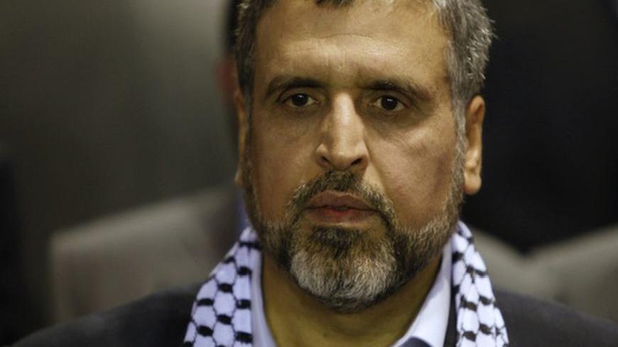 Ramadan Shallah, head of the militant Islamic Jihad group, attends a rally to mark the 23nd anniversary of the foundation his group held at a Palestinian refugee camp near Damascus November 5, 2010. REUTERS/Khaled al Hariri (SYRIA - Tags: ANNIVERSARY POLITICS)