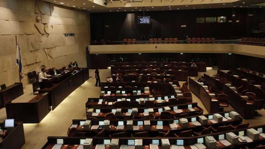 A general view of the Knesset, the Israeli parliament, is seen during a session boycotted by the opposition parties in Jerusalem June 17, 2009. Israel's parliament is expected to give its initial approval to the 2009 and 2010 state budgets later on Wednesday. REUTERS/Ammar Awad (JERUSALEM POLITICS BUSINESS) - RTR24QNR