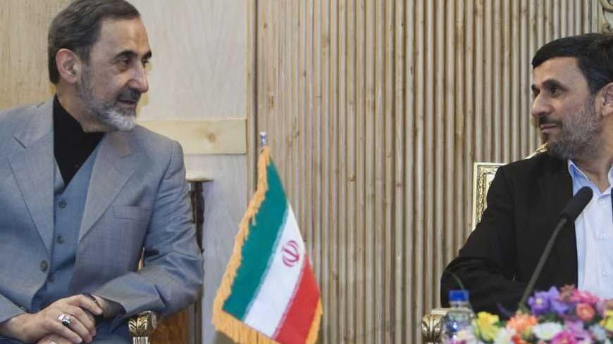 EDITORS' NOTE: Reuters and other foreign media are subject to Iranian restrictions on their ability to film or take pictures in Tehran.

Iran's President Mahmoud Ahmadinejad (R) speaks with Ali Akbar Velayati, senior advisor to Ayatollah Ali Khamenei after Ahmadinejad's visit to Latin American countries January 14, 2012. REUTERS/Raheb Homavandi  (IRAN - Tags: POLITICS)