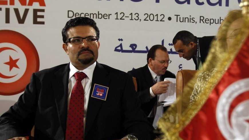 Tunisia's Minister of Foreign Affairs Rafik Abdessalem attends the 9th Forum for the Future, in Tunis December 13, 2012.  REUTERS/Zoubeir Souissi (TUNISIA - Tags: POLITICS)