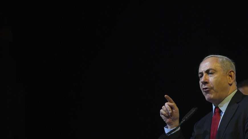 Israel's Prime Minister Benjamin Netanyahu speaks in front of Jewish youths in Jerusalem January 7, 2013. Three Israeli centrist and left-leaning parties have failed in an initial attempt to form a united bloc that might have cut into Netanyahu's opinion poll lead before the January 22 election.   REUTERS/Ronen Zvulun (JERUSALEM - Tags: POLITICS ELECTIONS)