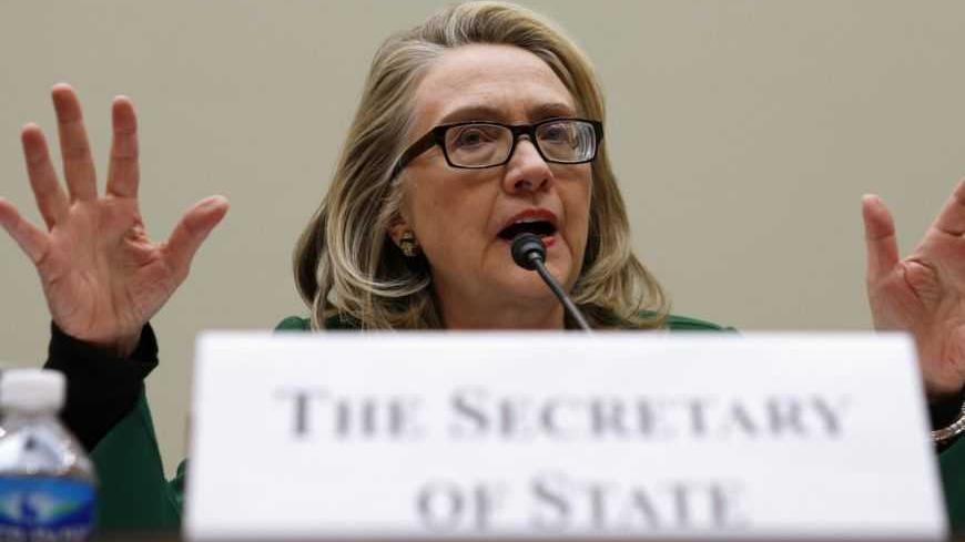 U.S. Secretary of State Hillary Clinton testifies on the September attack on U.S. diplomatic sites in Benghazi, Libya during a hearing held by the House Foreign Affairs committee on Capitol Hill in Washington January 23, 2013. REUTERS/Kevin Lamarque  (UNITED STATES - Tags: POLITICS) - RTR3CUXG