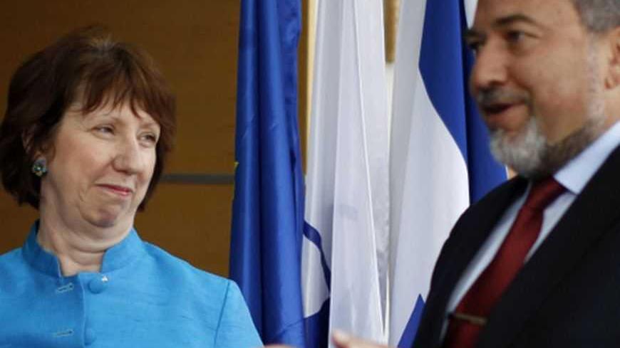 Israel's Foreign Minister Avigdor Lieberman and European Union foreign policy chief Catherine Ashton (L) speak to the media before their meeting in Jerusalem October 24, 2012. REUTERS/Ammar Awad (JERUSALEM - Tags: POLITICS)