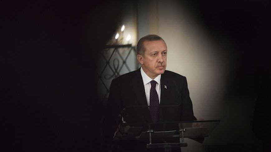 Turkey's Prime Minister Tayyip Erdogan speaks to the media during a meeting with Senegal's President Macky Sall at the presidential palace in Dakar January 10, 2013.   REUTERS/Joe Penney    (SENEGAL - Tags: POLITICS) - RTR3CA5T