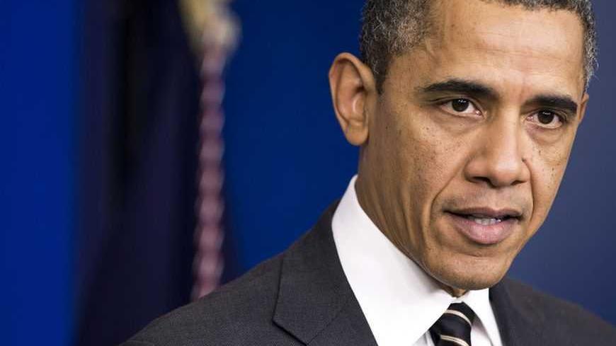 U.S. President Barack Obama calls on Congress to pass a small package of spending cuts and tax reforms that would delay the larger, automatic "sequester" cuts from going into effect during an announcement in the White House briefing room in Washington February 5, 2013. Huge cuts to defense and domestic programs are slated to go into effect in roughly three weeks, a threat that has caused uncertainty and negatively affected economic growth, a White House official said.   REUTERS/Joshua Roberts  (UNITED STATE