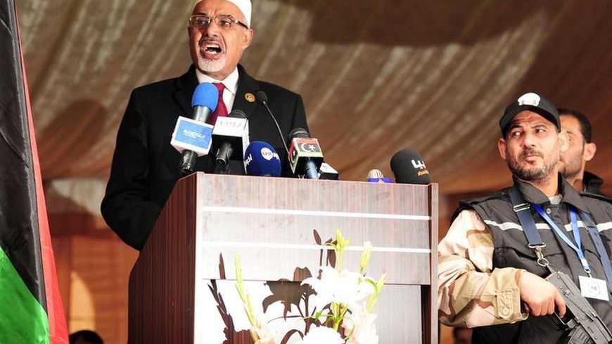 Libyan National Congress President Mohammed Magarief speaks at a ceremony to mark the second anniversary of the country's revolution in Benghazi February 17, 2013. REUTERS/Esam Al-Fetori  (LIBYA - Tags: POLITICS) - RTR3DWRD