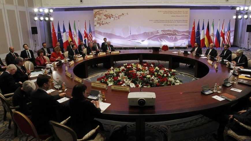 Top officials from the U.S., France, Germany, Britain, China, Russia and Iran take part in talks on Iran's nuclear programme in Almaty February 27, 2013. World powers hope Iran will respond positively on Wednesday to their new offer to lift some sanctions if Tehran scales back nuclear activity the West fears could be used to build bombs.  REUTERS/Shamil Zhumatov (KAZAKHSTAN - Tags: POLITICS ENERGY) - RTR3EC3H