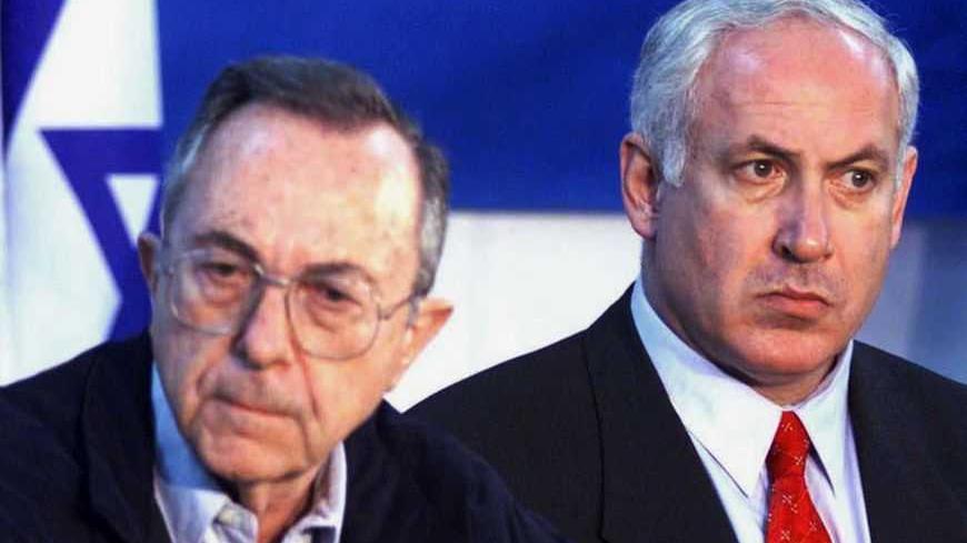 Israeli Defence Minister Moshe Arens and Israeli Prime Minister Benjamin Netanyahu  at a news conference in Tel Aviv February 28.  Arens said fighter planes had already raided key Hizbollah targets in Lebanon. The Israeli assault came in response to a roadside bomb that went off near an Israeli convoy in the south Lebanon occupation zone killing [Brigadier-General Erez Gerstein,] and a Radio Journalist and two soldiers.
**DIGITAL IMAGE** - RTXISY0