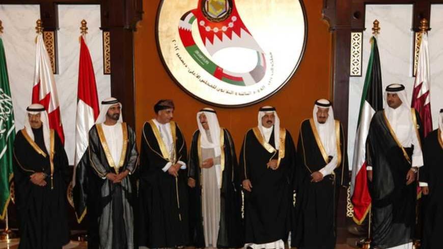Dignitaries pose for a group photo prior to the start of the Gulf Cooperation Council (GCC) Summit at Sakhir Palace in Sakhir south of Manama, Bahrain, December 24, 2012. (From L-R) Bahrain's Prime Minister Prince Khalifa bin Salman al-Khalifa, Emirates' Vice President Sheikh Mohammed bin Rashid al-Maqtoom, Deputy Premier of Omani Cabinet Affairs Fahd Bin Humoud Al Saieed, Emir of Kuwait Sheikh Sabah al Ahmed, King of Bahrain Hamad bin Isa al Khalifa, Saudi Crown Prince Salman al Saud, Qatari Crown Prince S