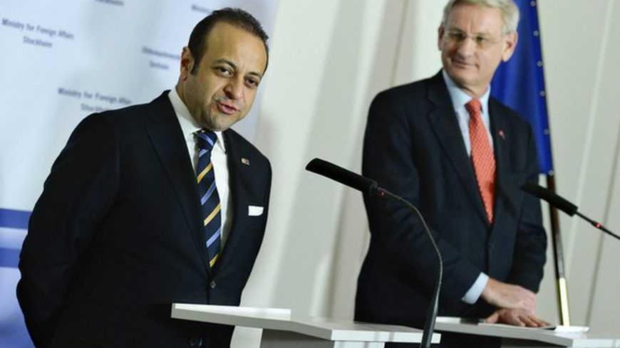 Turkey's EU Minister Egemen Bagis (L) and Sweden's Foreign Minister Carl Bildt hold a joint news conference at the Ministry for Foreign Affairs in Stockholm in this picture provided by Scanpix January 16, 2013. REUTERS/Claudio Bresciani/Scanpix (SWEDEN - Tags: POLITICS)
ATTENTION EDITORS - THIS IMAGE WAS PROVIDED BY A THIRD PARTY. FOR EDITORIAL USE ONLY. NOT FOR SALE FOR MARKETING OR ADVERTISING CAMPAIGNS. SWEDEN OUT. NO COMMERCIAL OR EDITORIAL SALES IN SWEDEN. THIS PICTURE IS DISTRIBUTED EXACTLY AS RE