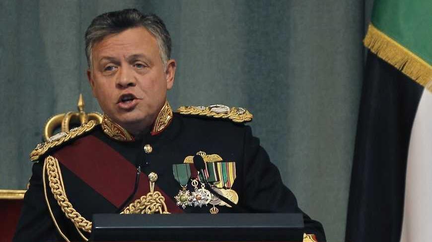 Jordan's King Abdullah delivers a speech during the opening of the first session for the new parliament in Amman, February 10, 2013.  REUTERS/Ali Jarekji (JORDAN - Tags: POLITICS ROYALS) - RTR3DKN4