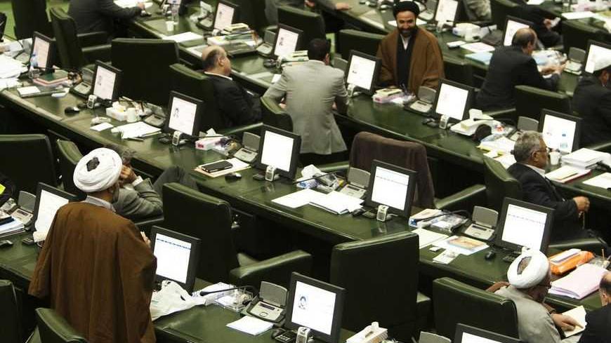 EDITORS' NOTE: Reuters and other foreign media are subject to Iranian restrictions on leaving the office to report, film or take pictures in Tehran.
A general view of a parliament session in Tehran November 1, 2011. Iran's parliament is threatening to impeach two of Mahmoud Ahmadinejad's ministers, in a new wave of pressure against the president who is under attack from lawmakers. REUTERS/Raheb Homavandi (IRAN - Tags: POLITICS BUSINESS CRIME LAW) - RTR2THAP