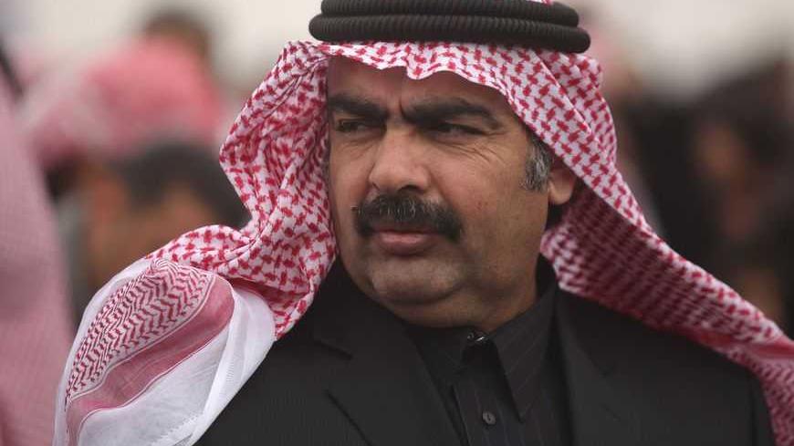Sunni tribal leader Sheikh Ahmed Abu Risha attends an anti-government demonstration in Ramadi, 100 km (62 miles) west of Baghdad, February 15, 2013. Thousands of Sunni Muslims protested after Friday prayers in huge rallies against Shi'ite Iraqi Prime Minister Nuri al-Maliki, demanding that he step down. REUTERS/Mohammed Al-Kubaisi (IRAQ - Tags - Tags: POLITICS CIVIL UNREST) - RTR3DUGT