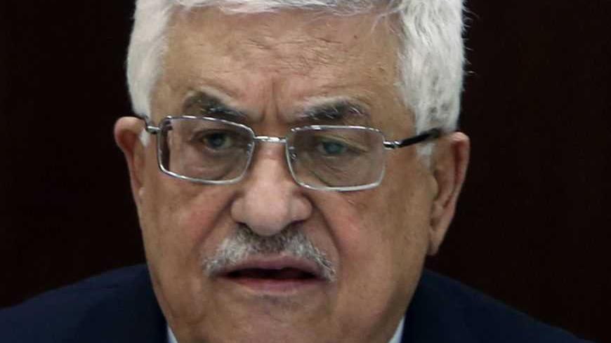 Palestinian President Mahmoud Abbas attends a Palestinian Liberation Organization (PLO) executive committee meeting in the West Bank city of Ramallah February 26, 2013. REUTERS/Mohamad Torokman (WEST BANK - Tags: POLITICS) - RTR3EAX8
