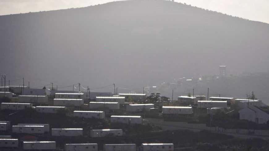 Prefabricated homes are seen in the West Bank Jewish settlement of Eli, south of Nablus March 17, 2013. U.S. President Barack Obama is due to make his first official visit to Israel and the Palestinian Territories this week, looking to improve ties after sometimes rocky relations with both sides during his first term in office. Israeli settlement expansion lies at the heart of much of the rancour between Israeli Prime Minister Benjamin Netanyahu and Obama, who has said the U.S. does not accept the legitimac