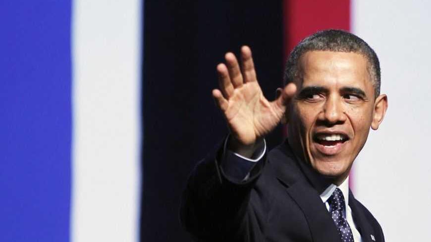 U.S. President Barack Obama waves after addressing Israeli students at the International Convention Center in Jerusalem March 21, 2013. Obama appealed directly on Thursday to the Israeli people to put themselves in the shoes of stateless Palestinians and recognise that Jewish settlement activity in occupied territory hurts prospects for peace. REUTERS/Baz Ratner (JERUSALEM - Tags: POLITICS) - RTR3FA4A