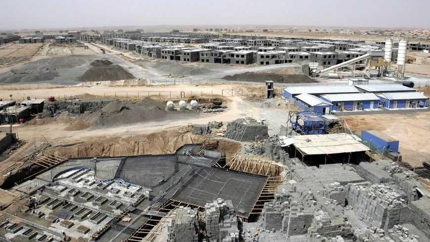 A view of an upscale housing project under construction in Arbil, 310 km (190 miles) north of Baghdad August 27, 2008. Iraqi Kurdistan has been priming for a wave of foreign investments for years, but the grand goals of this relatively peaceful northern enclave are frustrated by violence plaguing the rest of Iraq, officials say. To match feature IRAQ/INVESTMENT   REUTERS/Azad Lashkari (IRAQ) - RTX896Q