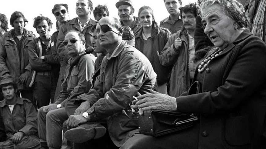 - FILE PHOTO 21NOV73 - Prime Minister Golda Meir (R) accompanied by her Defense Minister Moshe Dayan, meets with Israeli soldiers at a base on the Golan Heights after intense fighting during the 1973 Yom Kippur War.[ Israel was simultaneously attacked by Syria and Egypt on Yom Kippur, the Jewish Day of Atonement when all of Israel comes to a standstill, and was only able to defeat both countries when the United States provided an emergency major resupply of equipment. Israel suffered heavy causalities and m