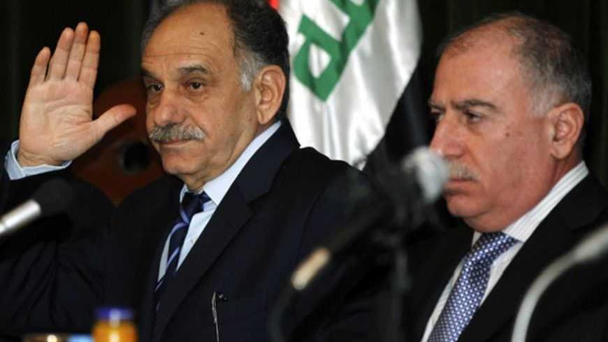 Iraqi Sunni Deputy Prime Minister Saleh al-Mutlaq (L) and Iraqiya Sunni speaker of parliament Osama al-Nujaifi hold a news conference for the seniors of Iraqiya bloc in Baghdad January 18, 2012.  REUTERS/Mohammed Ameen (IRAQ - Tags: POLITICS) - RTR2WGNT