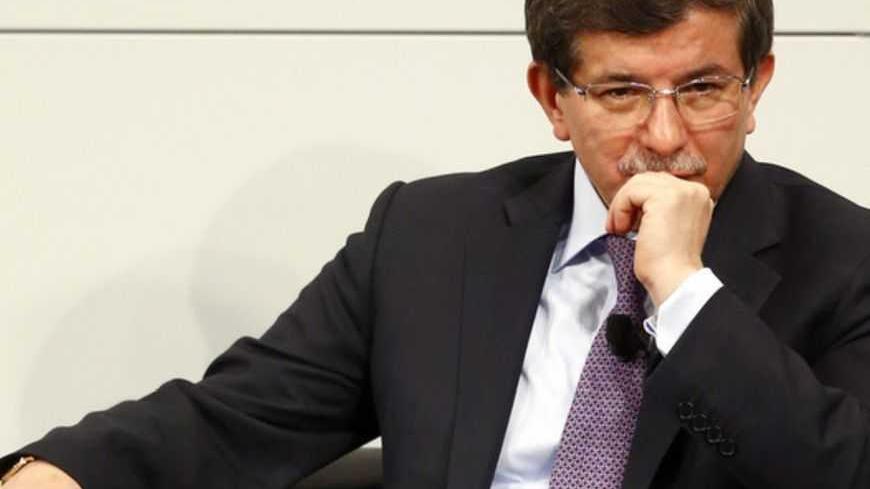 Turkish Foreign Minister Ahmet Davutoglu pauses during the 49th Conference on Security Policy in Munich February 3, 2013. Senior politicians along with the leader of the Syrian opposition are in Munich providing a rare opportunity for talks to revive efforts to end the civil war in Syria. REUTERS/Michael Dalder (GERMANY - Tags: MILITARY POLITICS) - RTR3DALG