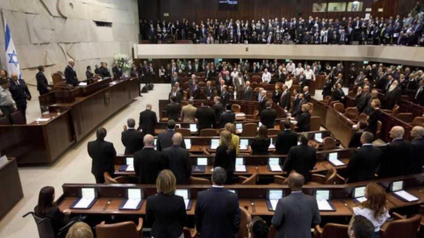 Members of the 19th Knesset, the new Israeli parliament, stand as President Shimon Peres arrives to their swearing-in ceremony in Jerusalem February 5, 2013. REUTERS/Uriel Sinai/Pool (JERUSALEM - Tags: POLITICS) - RTR3DDXN