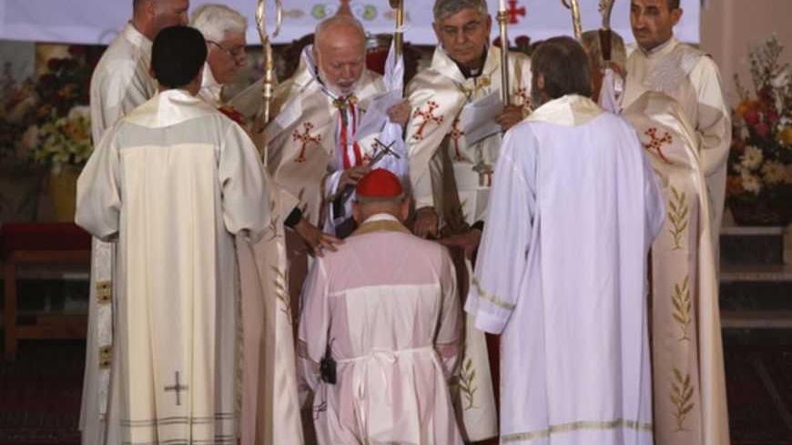 Louis Sako, the Chaldean Catholic Patriarch of Babylon and the Head of the Chaldean Catholic Church, attends a mass ceremony to enthrone him in Baghdad, March 6, 2013.   REUTERS/Saad Shalash (IRAQ - Tags: RELIGION) - RTR3EN22