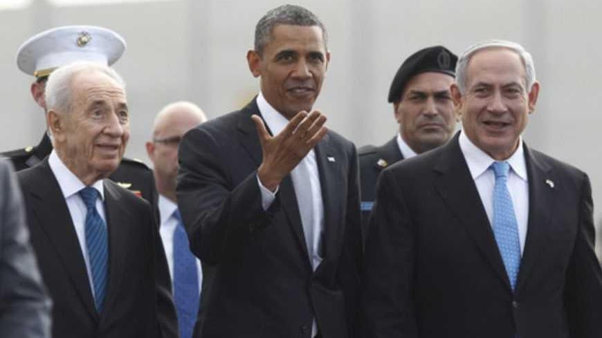 U.S. President Barack Obama (C) participates in a farewell ceremony with Israeli Prime Minister Benjamin Netanyahu (R) and President Shimon Peres (L) at Tel Aviv International Airport March 22, 2013. REUTERS/Jason Reed (ISRAEL - Tags: POLITICS) - RTR3FBWR