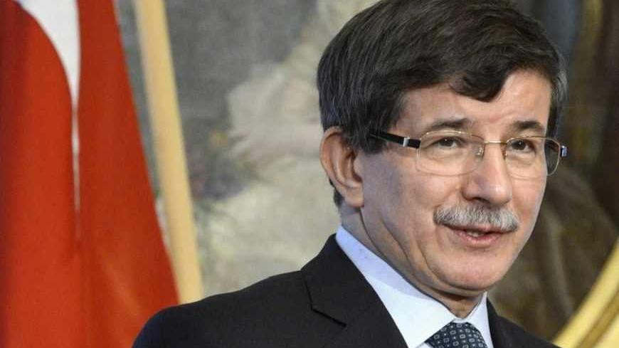 Turkish Foreign Minister Ahmet Davutoglu speaks during a news conference in Helsinki December 19, 2012. REUTERS/Kimmo Mantyla/Lehtikuva   (FINLAND - Tags: POLITICS) THIS IMAGE HAS BEEN SUPPLIED BY A THIRD PARTY. IT IS DISTRIBUTED, EXACTLY AS RECEIVED BY REUTERS, AS A SERVICE TO CLIENTS. NO THIRD PARTY SALES. NOT FOR USE BY REUTERS THIRD PARTY DISTRIBUTORS. FINLAND OUT. NO COMMERCIAL OR EDITORIAL SALES IN FINLAND - RTR3BQV8