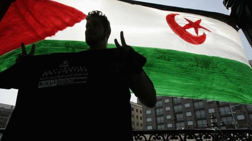 An activist takes part in a demonstration to demand the release of Moroccan political prisoners in Guadalajara, January 26, 2013. The demonstration was called in support of Sahrawi prisoners who have been in jail in Rabat, Morocco, since 2010. The Sahrawi prisoners are demanding their right to freedom as well as the independence of the territories occupied by Morocco in Western Sahara, according to the Sahrawi resistance organization. REUTERS/Alejandro Acosta (MEXICO - Tags: POLITICS CIVIL UNREST) - RTR3D0N