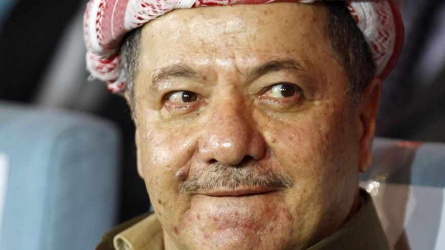 Masoud Barzani, president of Iraq's autonomous Kurdistan region, attends the opening of a conference on "Recognizing Kurdish Genocide" in Arbil, about 350 km (217 miles) north of Baghdad, March 14, 2013. REUTERS/Thaier al-Sudani (IRAQ - Tags: CIVIL UNREST POLITICS) - RTR3EZ32