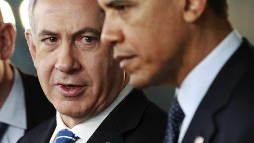 U.S. President Barack Obama and Israeli Prime Minister Benjamin Netanyahu (L) tour a technology expo at the Israel Museum in Jerusalem March 21, 2013.   REUTERS/Jason Reed   (JERUSALEM - Tags: POLITICS SCIENCE TECHNOLOGY) - RTR3F9EE