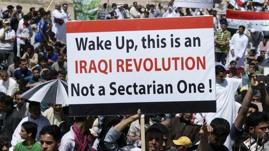 Iraqi Sunni Muslims take part in an anti-government demonstration in Falluja, 50 km (31 miles) west of Baghdad, April 5, 2013. Thousands of Sunni Muslims protested after Friday prayers in huge rallies against Shi'ite Iraqi Prime Minister Nuri al-Maliki, demanding that he step down. REUTERS/Mohanned Faisal (IRAQ - Tags: POLITICS) CIVIL UNREST) - RTXY9JG