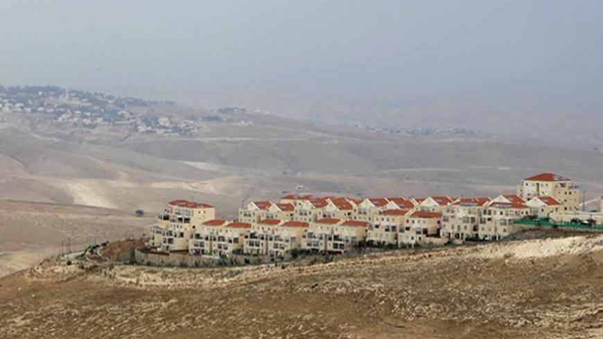 A view shows the West Bank Jewish settlement of Maale Adumim near Jerusalem in this picture taken December 4, 2012. Israel risks sleep walking into a crisis with its allies over relentless settlement-building in the occupied West Bank and East Jerusalem unless it realises that the international anger is genuine and adjusts its course. Picture taken December 4, 2012. To match Analysis ISRAEL-PALESTINIANS/ISOLATION REUTERS/Ammar Awad (WEST BANK - Tags: POLITICS) - RTR3DF7C