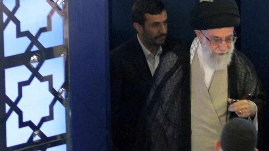 EDITORS' NOTE: Reuters and other foreign media are subject to Iranian restrictions on leaving the office to report, film or take pictures in Tehran.
Iran's supreme leader Ayatollah Ali Khamenei (R) and President Mahmoud Ahmadinejad walk during the morning Eid al-Fitr prayers at Tehran University August 31, 2011.  Khamenei said on Wednesday a parliamentary election scheduled for early next year posed a potential risk to the country's security and he called for national unity. After the contested re-election