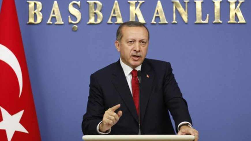 Turkey's Prime Minister Tayyip Erdogan speaks during a news conference in Ankara October 19, 2011. Turkish troops killed 15 Kurdish militants in clashes in southeast Turkey near the Iraqi border on Wednesday after attacks by the rebels which killed 26 soldiers, security officials in the region told Reuters. REUTERS/Umit Bektas (TURKEY - Tags: POLITICS CONFLICT) - RTR2SUBU