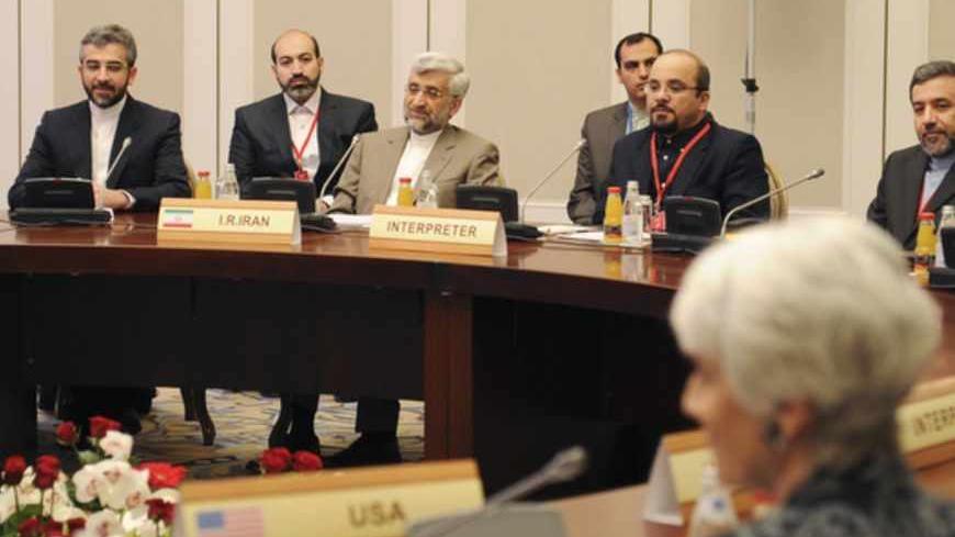 Members of the Iranian delegation, led by Supreme National Security Council Secretary and chief nuclear negotiator Saeed Jalili (3rd L), sit at a table during talks in Almaty February 26, 2013. World powers began talks with Iran on its nuclear programme in the Kazakh city of Almaty on Tuesday, in a fresh attempt to resolve a decade-old standoff that threatens the Middle East with a new war. REUTERS/Ilyas Omarov/Pool  (KAZAKHSTAN - Tags: POLITICS ENERGY) - RTR3EAS0
