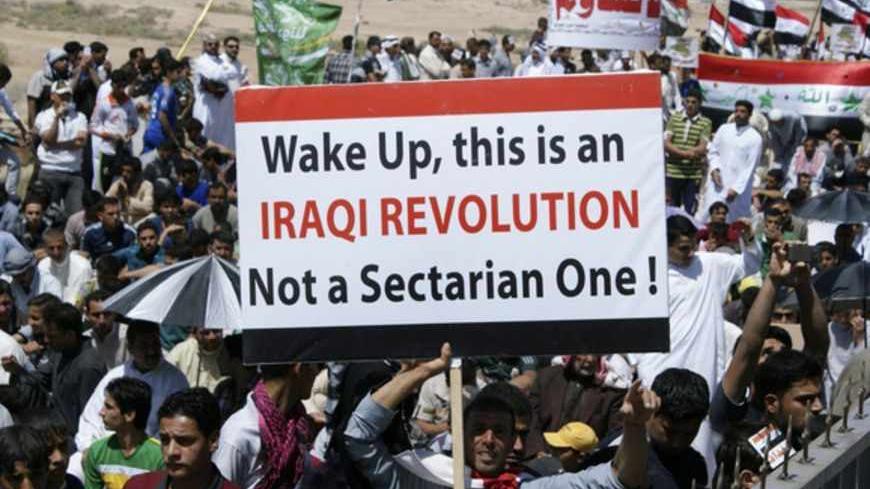 Iraqi Sunni Muslims take part in an anti-government demonstration in Falluja, 50 km (31 miles) west of Baghdad, April 5, 2013. Thousands of Sunni Muslims protested after Friday prayers in huge rallies against Shi'ite Iraqi Prime Minister Nuri al-Maliki, demanding that he step down. REUTERS/Mohanned Faisal (IRAQ - Tags: POLITICS) CIVIL UNREST) - RTXY9JG