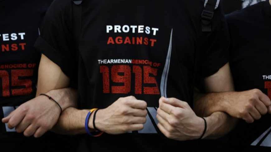 Armenian protesters shout slogans against Turkey during a demonstation near the Turkish embassy in central Athens, April 24, 2013. Hundreds of Armenians marched to commemorate the 98th anniversary of the mass killing of Armenians in the Ottoman Empire in 1915. Twenty one countries worldwide, including Greece, Russia, and France as well as the European parliament recognize the mass killings as an act of genocide, despite strong objections from Turkey. REUTERS/Yannis Behrakis (GREECE - Tags: CIVIL UNREST ANNI