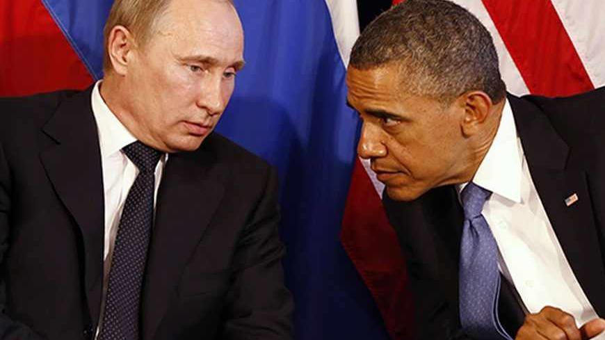 U.S. President Barack Obama meets with Russia's President Vladimir Putin in Los Cabos, Mexico, June 18, 2012. The leaders are in Los Cabos to attend the G20 summit.       REUTERS/Jason Reed   (MEXICO - Tags: POLITICS) - RTR33TY7