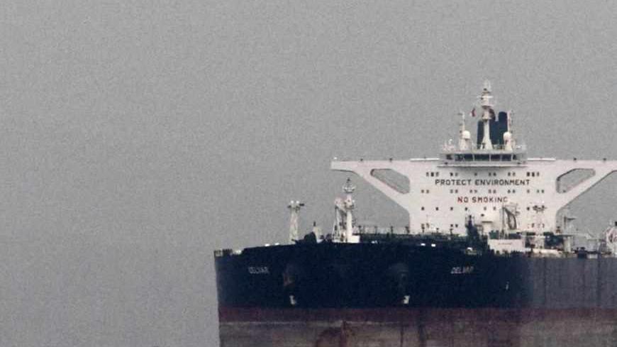 Malta-flagged Iranian crude oil supertanker "Delvar" is seen anchored off Singapore March 1, 2012. Western trade sanctions against Iran are strangling its oil exports even before they go into effect, a U.S. advisory body has found, amid warnings that any shortages will only push up crude prices and strain a weak global economy. REUTERS/Tim Chong (SINGAPORE - Tags: ENERGY BUSINESS MARITIME TRANSPORT) - RTR2YO8E