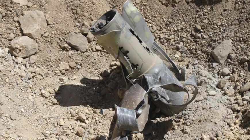 A view shows the remains of a rocket, which residents say was recently fired into the mainly Shi'ite town of Hermel, about 30 km (20 miles) north of Arsal May 28, 2013. Several rockets have been fired into Hermel in the past 24 hours. One of them killed a woman and wounded two people, the Lebanese army said.  REUTERS/Rami Bleibel (LEBANON - Tags: POLITICS CIVIL UNREST MILITARY CONFLICT) - RTX1041R
