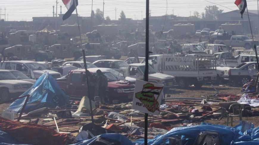 A view of a destroyed makeshift camp at a public square in Hawija, near Kirkuk, 170 km (100 miles) north of Baghdad April 23, 2013. Iraqi forces stormed the Sunni Muslim protest camp on Tuesday, and more than 50 people were killed in the ensuing clashes which spread beyond the town of Hawija, to other areas. Picture taken April 23, 2013.   REUTERS/Stringer (IRAQ - Tags: CIVIL UNREST MILITARY POLITICS) - RTXYZEU