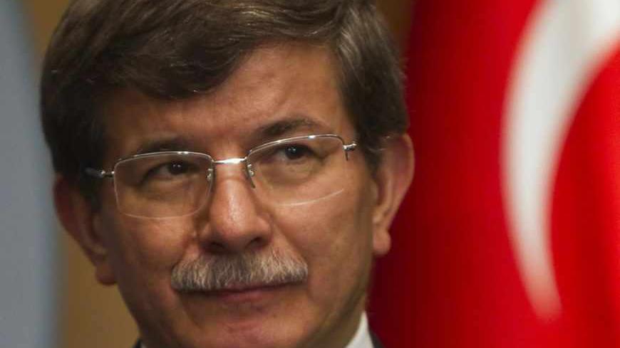 Turkey's Foreign Minister Ahmet Davutoglu is pictured after a signing ceremony granting Turkey a partner status in the Shanghai Cooperation Organisation (SCO), in Almaty April 26, 2013.  REUTERS/Shamil Zhumatov  (KAZAKHSTAN - Tags: POLITICS BUSINESS) - RTXZ0SD