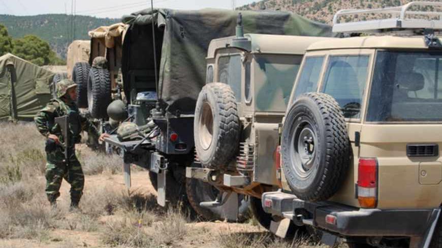 == TUNISIA OUT ==
Tunisian army vehicles are deployed in Kasserine, the regional capital of the western region of Mount Chaambi, on May 7, 2013, as soldiers continue their hunt for a jihadist group hiding out in the the border region with Algeria. Tunisian authorities recognised that two jihadist groups which the army has been hunting on the Algerian border have links to Al-Qaeda, stressing their determination to take them out. AFP PHOTO / ABDERRAZEK KHLIFI        (Photo credit should read ABDERRAZEK KHLIFI
