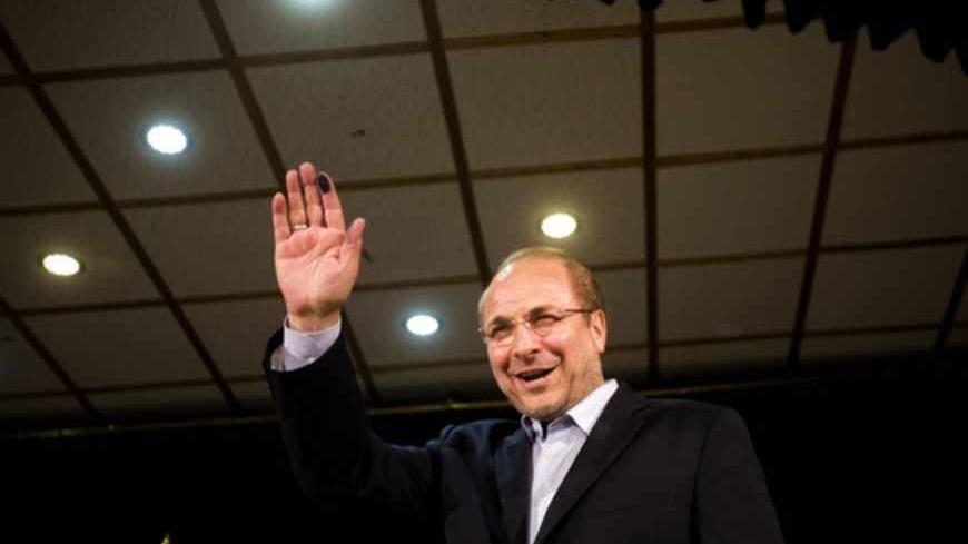 Mayor of Tehran, Iranian Mohammad Baqer Qalibaf attends a press conference after registering his candidacy for the upcoming presidential election at the interior ministry in Tehran on May 11, 2013. Iran will close the five-day registration period for candidates in Iran's June 14 presidential election, with a string of conservative hopefuls in the running but with key reformists yet to come forward, media reports said. AFP PHOTO/BEHROUZ MEHRI        (Photo credit should read BEHROUZ MEHRI/AFP/Getty Images)